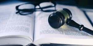 gavel, glasses, and book