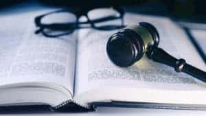gavel, glasses, and book