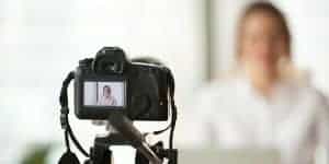 camera recording a woman