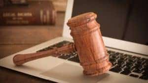 gavel resting on a computer