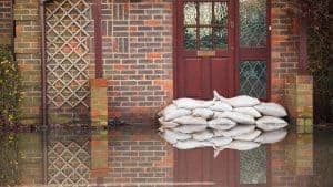 Flooded house with sandbags our front