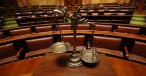 scales of justtice in a courtroom