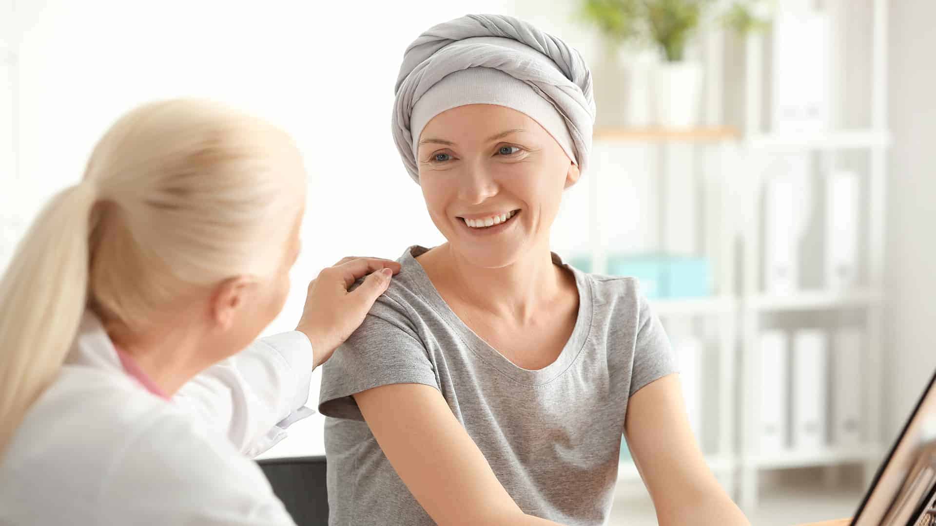 doctor talking to a chemotherapy patient