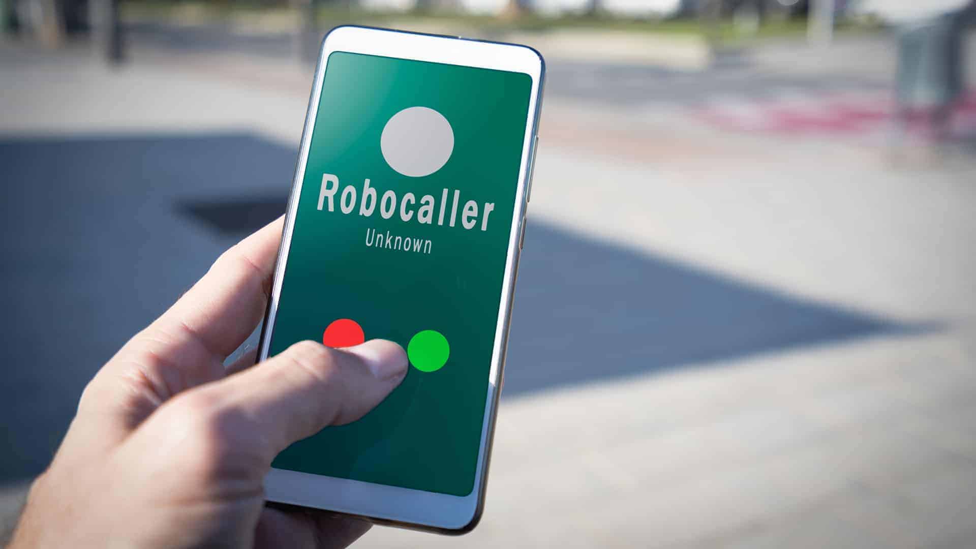 Smartphone showing a call from a robocaller on screen