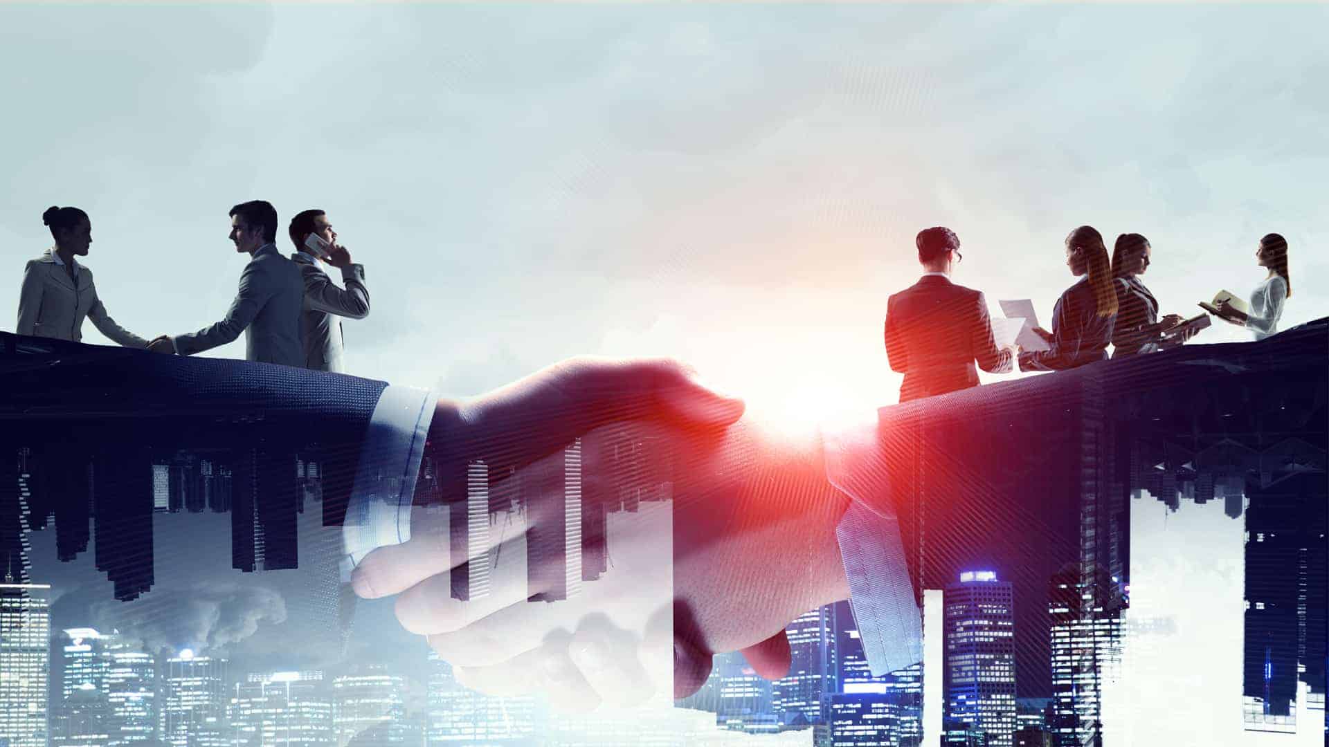 mixed media of business people, skyline, and superimposed handshake
