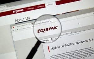 A magnifying glass focusing on equifax