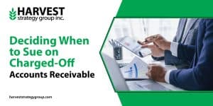 Two Creditors review account paperwork to decide how to best recover debt.