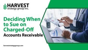 Two Creditors review account paperwork to decide how to best recover debt.