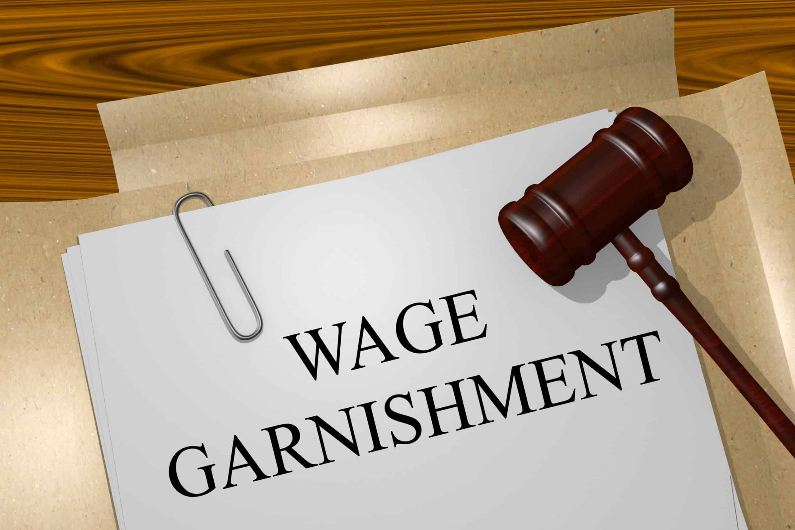 Wage garnishment on a piece of paper with a gavel.