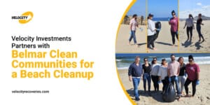 Velocity Investments employees volunteering at Belmar Beach during a cleanup event with Belmar Clean Communities, collecting litter and helping preserve the coastline.
