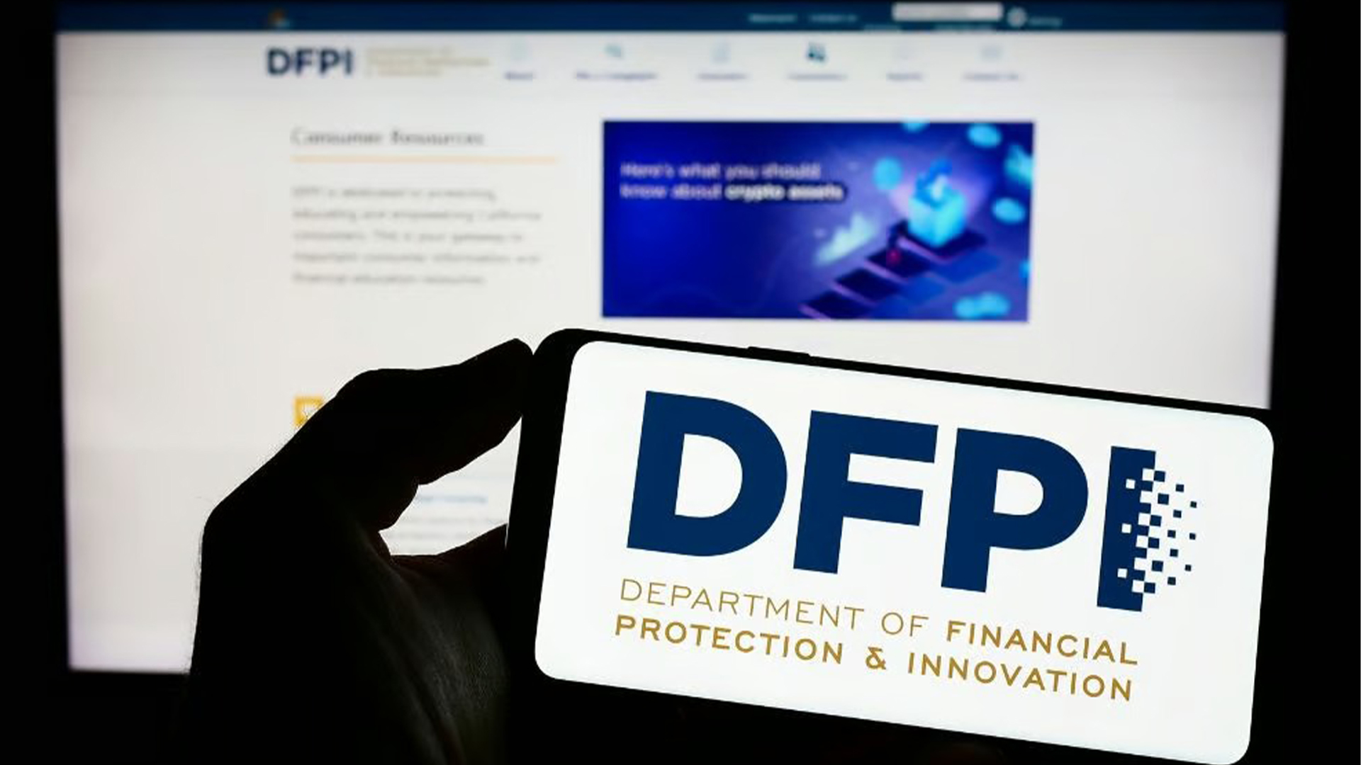 Person holding mobile phone with logo of Californian department DFPI on screen in front of web page