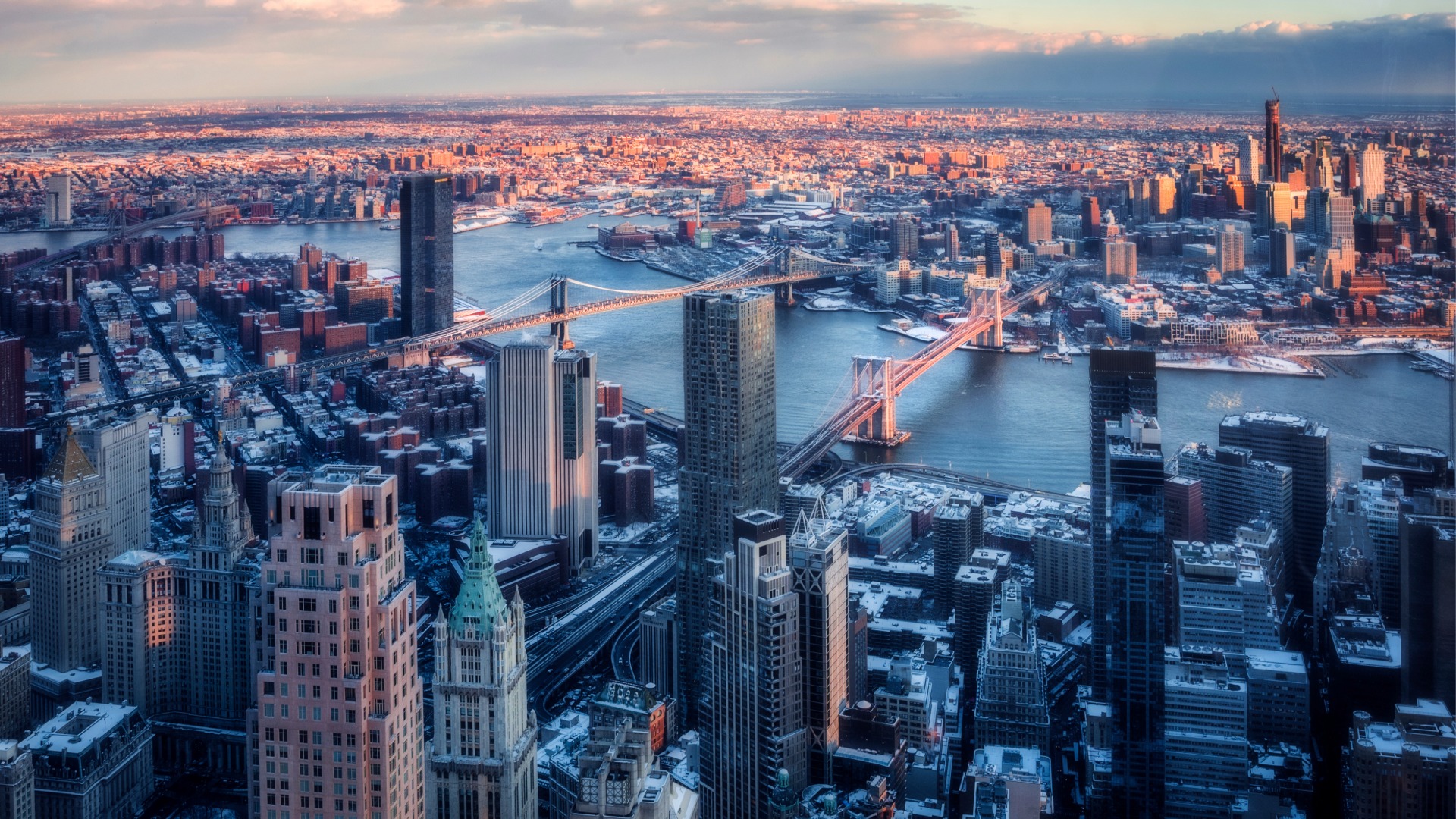 Sunset over Brooklyn, Manhattan and Williamsburg Bridges.